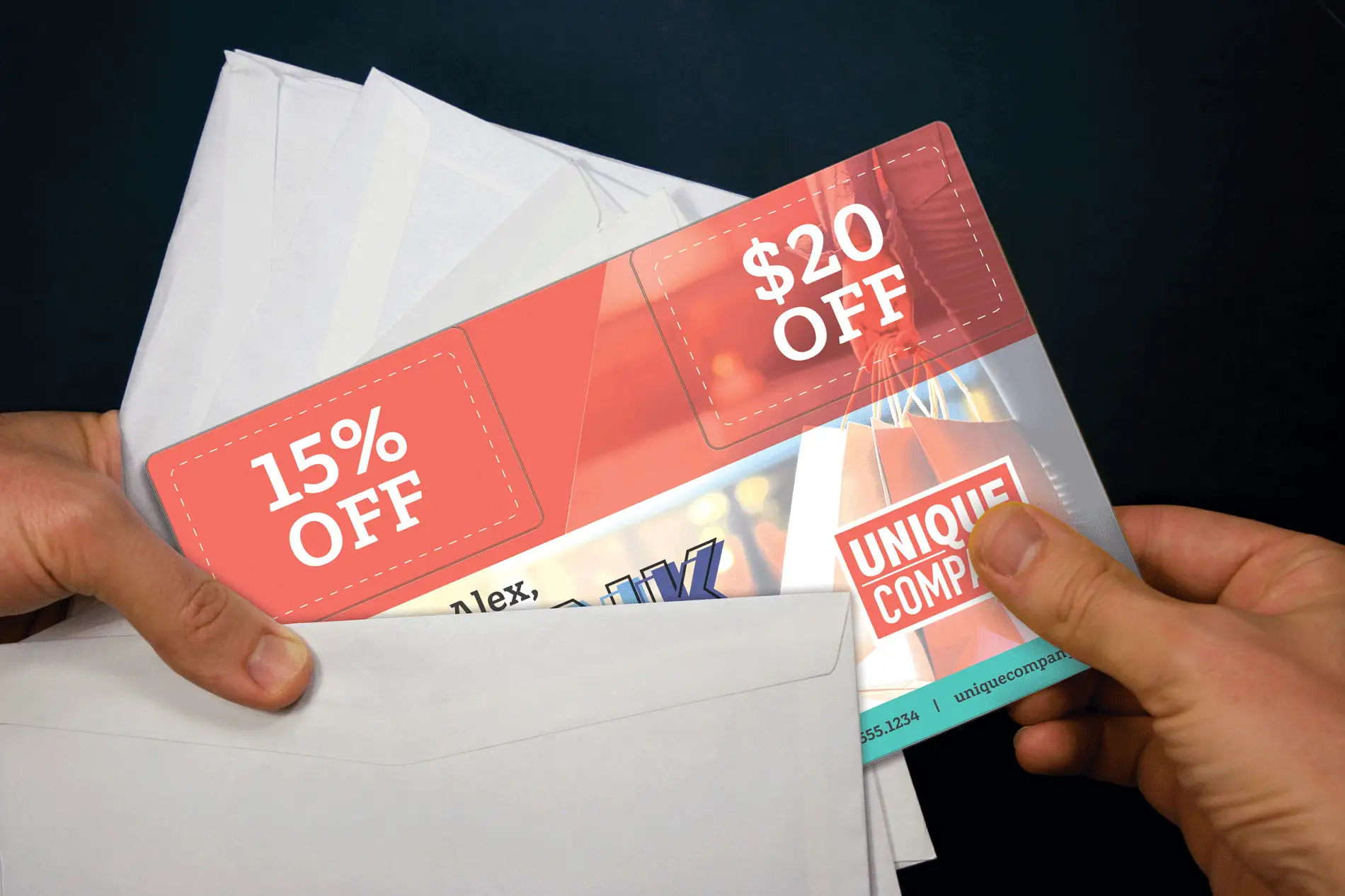 Hands holding mail and Super AcclaimMailer™ plastic postcard
