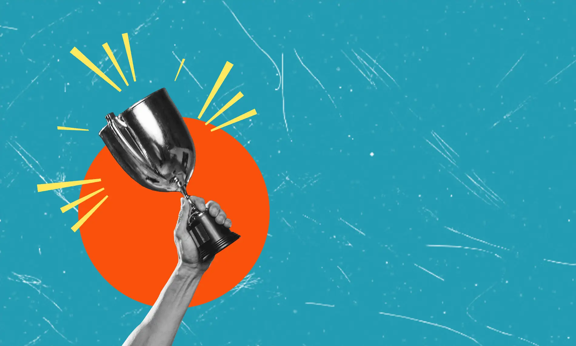 Hand holding a victory trophy