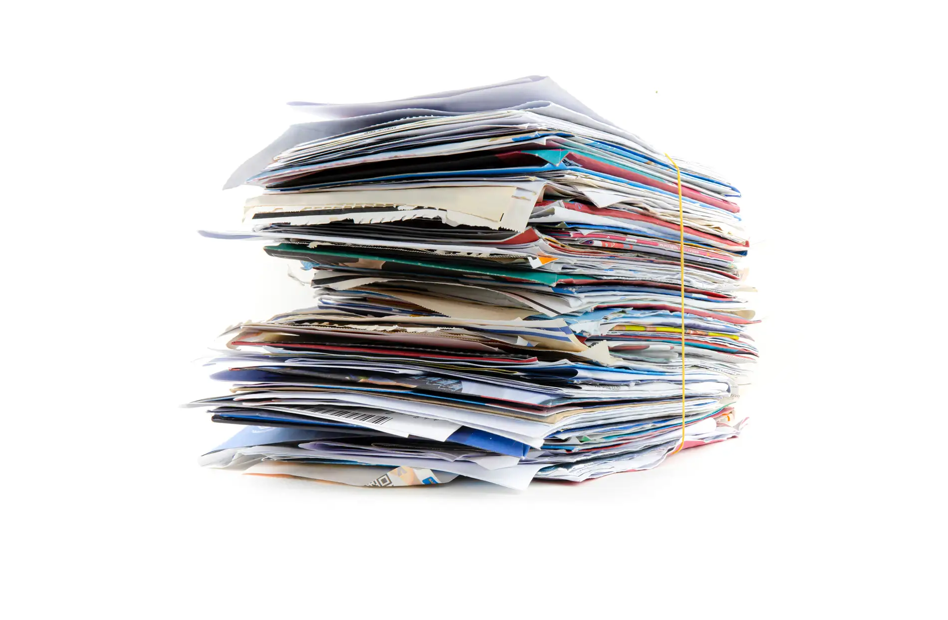 Stack of bulk mail bundled with a rubber band.